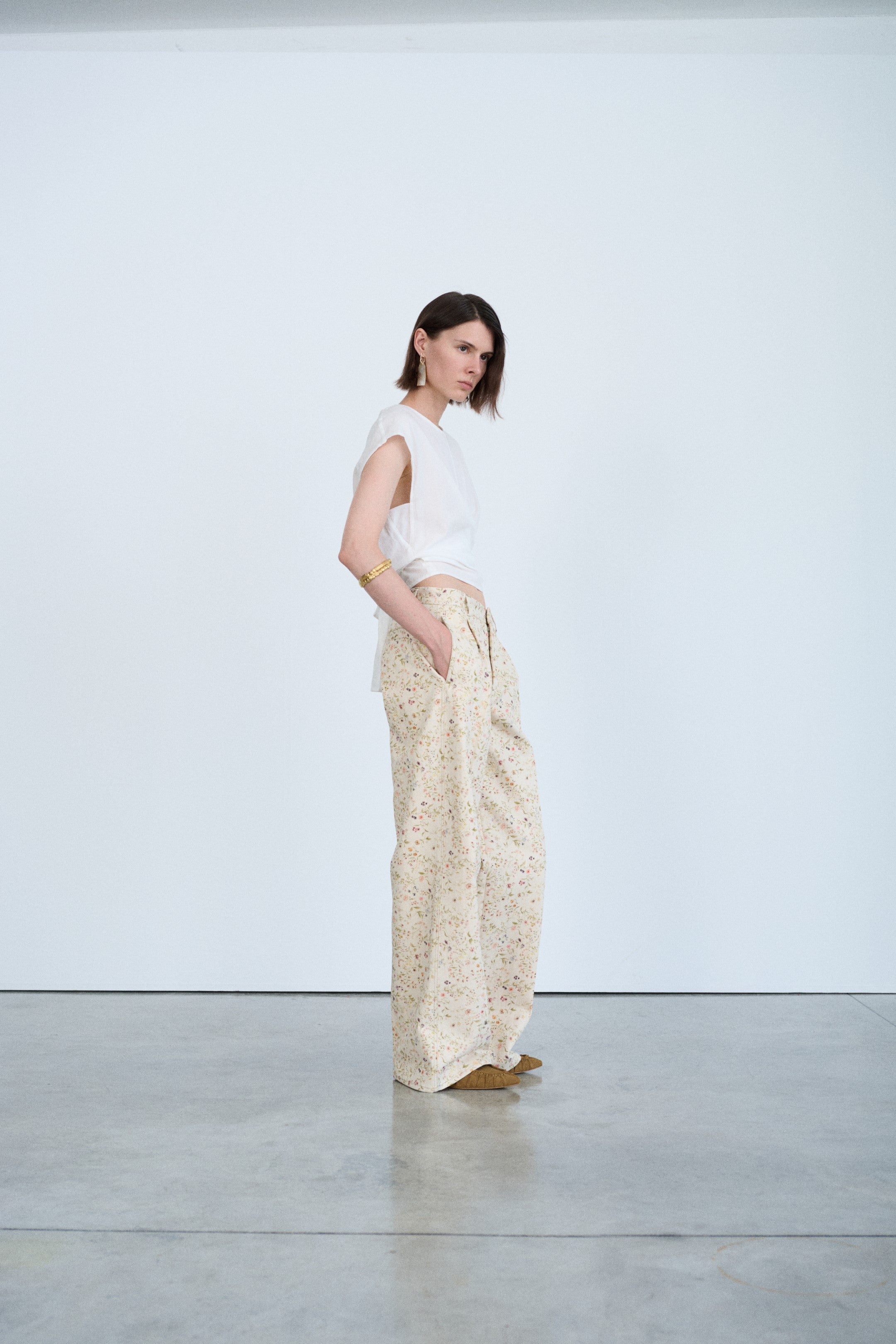 Sleeveless White Muslin Top With Back Knot Closure